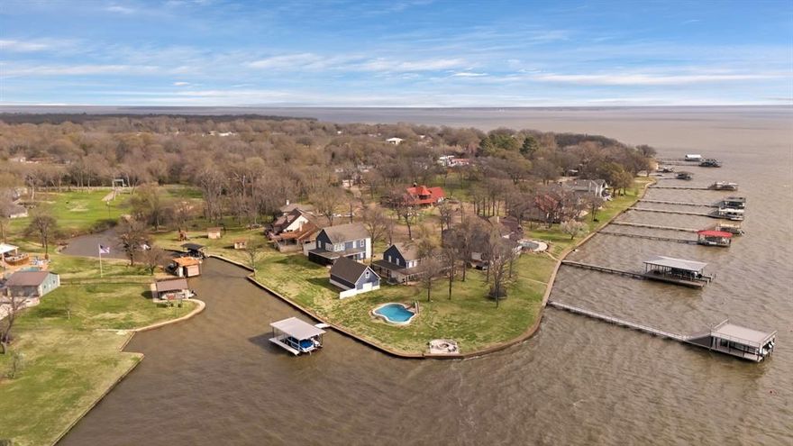 Cedar Creek Lake is a flourishing area which means owning property here now could inherit the benefits of population growth and infrastructure nearby.  The land is situated in the central part of the lake and only a few miles from public boat ramps, shopping, and entertainment. The lake is one of the largest in Texas and offers exceptional fishing and recreational boating. This large waterfront tract features two contiguous empty lots, and is on the end of a cul de sac! This is a wonderful opportunity to own property that allows for not only private access to a superb lake, but to also join a high quality community. Prestige Point is a very charming established neighborhood with only 33 total lots. Most lots have already been built on. Pride of ownership is obvious throughout this gated and well-maintained waterside community. If you have general questions about home building restrictions or dock construction for this community, please call the listing agent. Kemp is conveniently located about 45 minutes from Dallas and an hour from Tyler. The well-known Canton Flea Markets, also called First Monday Trade Days, are a short drive away.