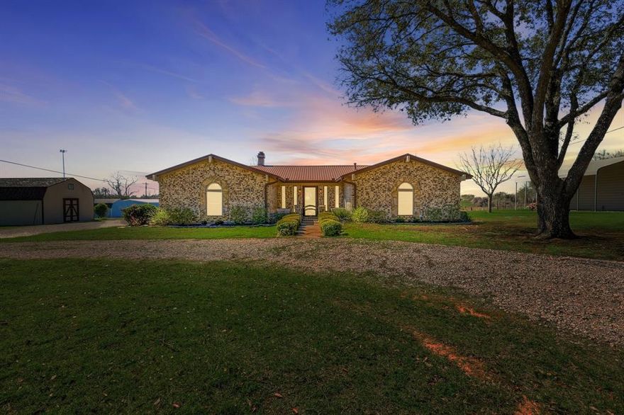 Here is your slice of Texas country just 30 minutes outside of downtown Fort Worth! This charming property has a 3 bedroom 2 bathroom home with a metal roof put on in 2016 sitting on a beautiful tract a bit under 2 acres with a fenced-in pasture and barn that has been used for livestock. Inside the home has a great split floor plan. The rustic stone fireplace comes with a gas starter and is perfect for those frosty nights. The countertops in the bathrooms and kitchen have been upgraded to a beautiful granite. Outside, enjoy the cool breeze and calming views from your back yard while you BBQ. The back driveway is covered with a large carport plus covered area for cooking or even a hot tub! A new aerobic septic system was installed in 2024, a tankless gas water heater was installed in 2020, and the HVAC system was replaced in 2023. With all the majors in great working order, this home comes with peace of mind. The wooden storage shed is in great condition and has a double barn loft for tons of storage. The metal workshop has a covered lean-to, perfect for parking a tractor or other vehicles and is wired with electricity and lighting inside. With easy access to the metroplex and room to breath, this home and its tranquil acreage is ready to be a part of the dream you're ready to build!