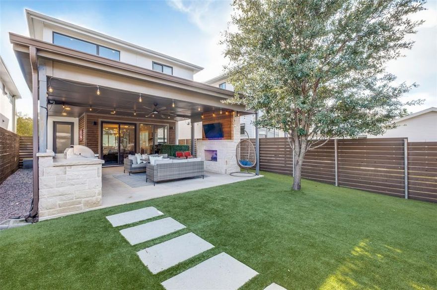 Steps from Glencoe Park, this idyllic home resides in a neighborhood conveniently situated near SMU, Mockingbird Station, Greenville Avenue, shops, dining, parks, and 75 for easy commuting. This home has an incredible 400ft covered outdoor living space with stone gas fireplace, built-in grill and fridge, ceiling fan, plus a turfed yard. Bright and light first floor with open floor plan, beautiful dark hardwoods and plantation shutters. Kitchen offers large island with seating, gas cooktop, built-in oven and microwave, and huge pantry with extra storage. Sliding doors from living room to outdoor living creates a seamless space for entertaining and everyday living. Upstairs has a nice landing for a play space or reading nook, 2 nicely sized bedrooms with a shared bath, and the primary suite offering dual sinks, spacious shower, and walk-in closet. Upstairs laundry room. This home also offers OWNED solar panels, offering energy efficiency and low electricity bills! Detached oversized 2 car garage, tankless water heater, low maintenance turf, mature landscaping. Feeds to Mockingbird Elementary!