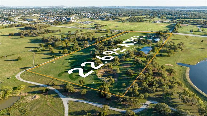 AUCTION BIDDING OPEN! Bidding ends 10-2-23 . Previously Listed $5,995,000. Current High Bid $2,650,000. No Reserve. Showings by Appointment, Open Sat-Sun 1-4 PM.

Discover the hidden gem of Gold Medal Farm. Conveniently located between Dallas & Fort Worth, this 22-plus-acre estate offers a private world of luxury living & any equestrian’s dream come true. The primary residence is a vision of Traditional architecture, constructed of brick, stone and wood. Its open floor plan features gleaming wood floors, soaring vaulted ceilings, & intricate woodwork that bring interest to every room. The lush landscaping is complimented by the inviting pergola, outdoor grill, and fire pit. Ride and train year-round with the covered arena, a generous 200’ by 80’ shaded retreat equipped to operate through sunny Texas summers. The handsome main barn boasts 12 stalls beneath a vaulted roof, plus an apartment, tack room, office, and washroom.