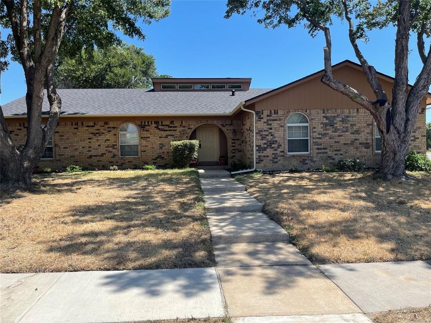 What a great location! Close to Freeways, Shopping, and Schools. Remodeled Kitchen with Custom Built Cabinets with shelves, racks, and drawers, 
trash compactor, Granite counter tops, and Backsplash. Both bathrooms have been updated. Large Living area with wood burning fireplace, and Vaulted ceilings.  Very private large backyard with eight foot Wood Fence. 2 car side garage with a storage space for workbench. Bonus Room 20X10 for work out room or plants.  This room is not in square footage.  Roof replaced July 2023. Water heater replaced June 2023. Carpet in 2 bedrooms replaced August 2023. Ready for New Buyer. Don't wait, and lose out. No Survey available, Buyer to pay for new one if needed.