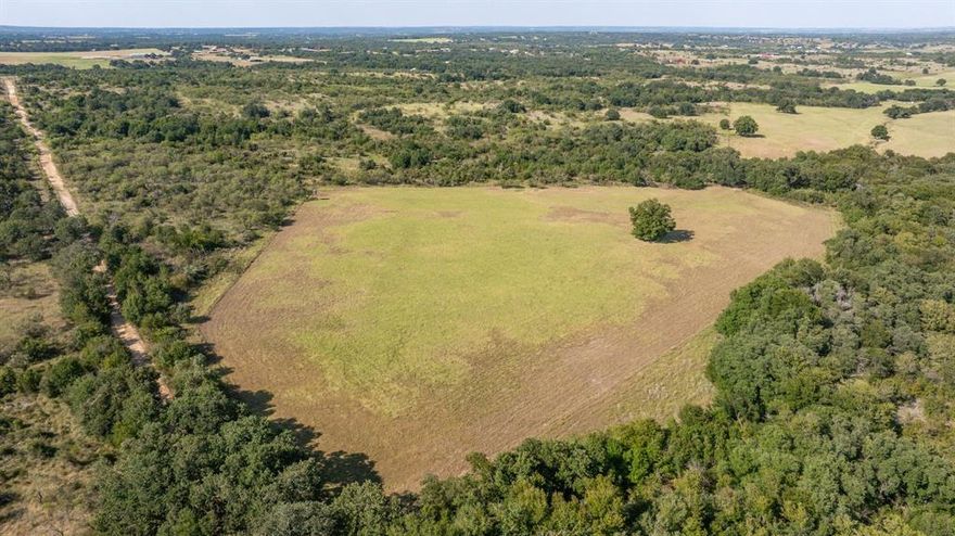 Great opportunity here! Not often does a tract of land this large with road frontage on multiple roads come along! This one is located just about 2 or 3 miles north of Stephenville with access on US Hwy 281 and CR 164! This property features sandy loam soil, several improved grass fields and beautiful Oak and Pecan trees throughout! This Ranch is loaded with wildlife, so many deer, turkey and the occasional wild hog! This would make a fantastic hunting property, and with its proximity to town a great investment with tremendous growth potential! This would also make a fantastic sub divsion or development! The ground is perfect for some small horse properties! They would be an absolute hot commodity in our area! Ground water is also very strong in this area, with all the neighboring wells producing good water! This place has so much potential! Come take a look and let me show you all the opportunities this ranch has to offer!!