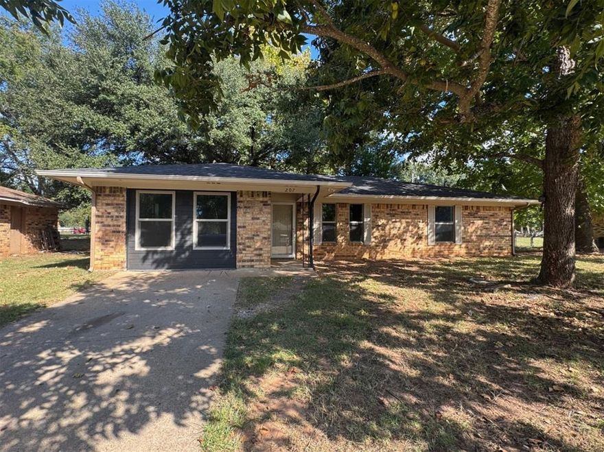 Welcome home, y’all! This charming 3-bedroom brick beauty sits on a big, shaded lot in Westwood ISD and is full of warmth and character. Step inside to find a freshly remodeled interior with all the right touches and plenty of space to make your own. The enclosed garage adds a fantastic bonus room—perfect for a cozy media room, fun playroom, or quiet home office. Outback, you’ll love the oversized yard complete with a built-in fire pit, just waiting for cool fall nights and a round of s’mores with friends. This one’s move-in ready and full of that sweet East Texas charm!