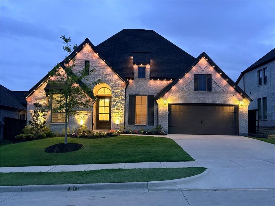 Why wait to build when you can have move-in ready perfection? PERRY HOMES’ most sought-after floor plan, ideally situated on a premium 60' lot with a 3-CAR garage. Take advantage of up to a 1% lender credit—available for conventional, FHA, and VA loans—which can be applied toward a 12-month introductory interest rate 1% below market when using the preferred lender. This stunning, meticulously maintained single-story home offers 4 bedrooms, 4 baths, a private office, and a versatile media-flex room—thoughtfully designed with upgrades and designer finishes throughout. The seller has elevated every detail with Smart Home lighting, JellyFish exterior lighting, custom drapery, high-end cabinet hardware, and ceiling fans in every bedroom. The luxurious primary suite is a true retreat, featuring a custom batten board accent wall, shiplap ceiling, and striking wood beam detail—blending warmth with sophisticated design. The well-planned layout includes a private office at the entry, two secondary bedrooms with a shared bath, and a secluded fourth bedroom with its own ensuite—ideal for guests or multigenerational living. At the heart of the home, the chef’s kitchen showcases shaker-style painted cabinetry, a contrasting stained island, quartz countertops, gas cooktop, and designer tile backsplash, plus added electrical outlets and abundant storage. The open-concept living area is filled with natural light from a dramatic wall of windows, complete with window tint for energy efficiency and privacy. Step outside to your low-maintenance backyard oasis featuring artificial turf, irrigated flower beds, additional trees, and an extended covered patio with ceiling fan and grill—perfect for relaxing or entertaining. Additional highlights include upper garage storage and countless thoughtful upgrades. This exceptional home truly has it all—be sure to review the full list of upgrades.