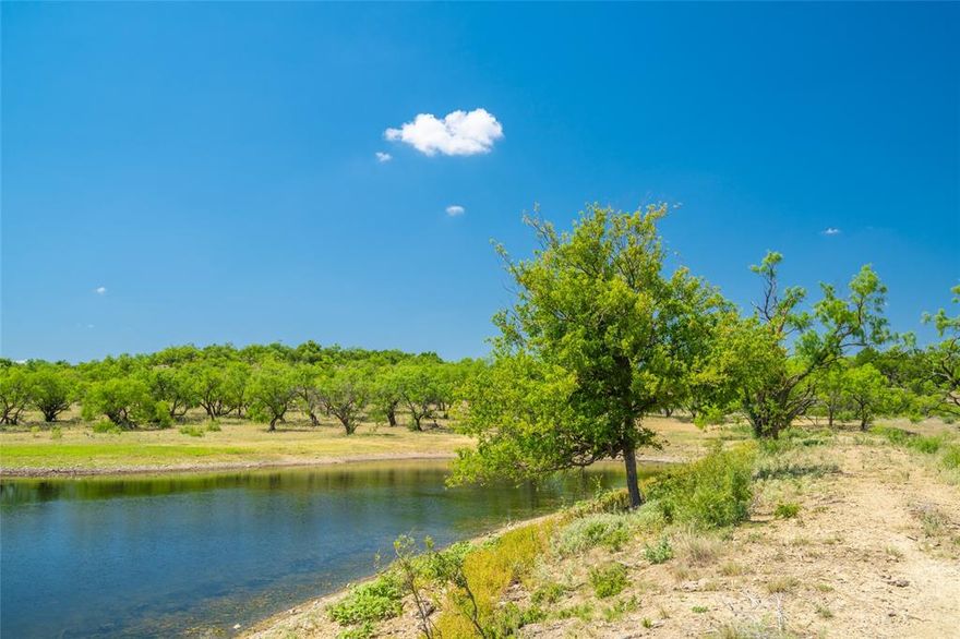 Mesquite Creek Ranch was built with recreation, fishing, livestock, and wildlife in mind. Expansive water tanks stocked with bass, crappie, and catfish are thoughtfully placed throughout the ranch. Even in the driest climate, the stock tanks hold water and are a reliable water source for livestock and wildlife. Complete with an efficient camp prepared for weekend stays and two recently-built sets of cattle working pens, low-fenced and is surrounded by large tracts of un-hunted land. The 6 strand barbed-wire fence on the perimeter and interior of the property and two pipe entrances provide easy access to both sets of working pens. The 85 acre field has improved grasses and 5 pastures that are used for rotational grazing of 100 cows. 2 water wells that provide water for livestock troughs and the weekend camp, additionally community water is available from the nearby town of Cross Plains if desired by the buyer. This ranch has it all and is ready to go for any type of user.