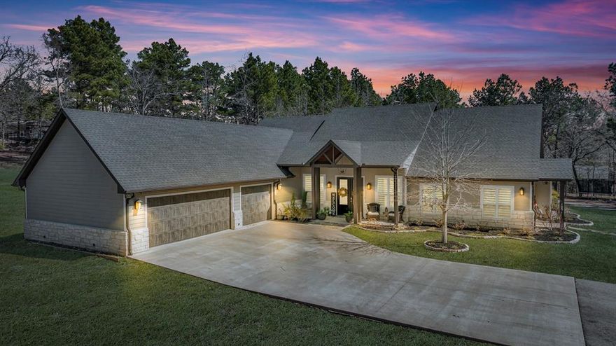 Welcome to your dream retreat! Nestled on 10.92 acres of breathtaking rolling terrain, this 3-bedroom, 2.5-bath home, with 2 additional bonus rooms that offer an exceptional blend of luxury, comfort, and outdoor beauty with 2989 square feet of living space. Located off the road, the estate is accessed by a long, winding asphalt driveway that leads directly back to the expansive shop, ensuring both privacy and convenience. Step inside to an open floor plan with tall ceilings throughout, creating an airy and inviting atmosphere. The heart of the home is the gourmet kitchen, featuring a spacious island perfect for entertaining. Just off the large living area, a dedicated office, and a workout room. One of the bedrooms is currently used as a den but is large enough to serve as a bunk room. Outside, the resort-style heated pool with a waterfall and attached hot tub serves as a stunning centerpiece. The enormous back porch boasts a fully equipped outdoor kitchen, making it the perfect space for entertaining. The fenced-in yard provides a separate safe haven for pets, while you enjoy your beautiful backyard oasis. Car enthusiasts and hobbyists will appreciate the oversized three-car garage in addition to the massive man cave that’s detached behind the home. The property also features wooded acreage to explore, along with a tranquil pond. Additionally, the home is fully wired and ready for a whole house generator as well as foam insulated for efficiency. The entire home is also wired for a speaker system, adding to its modern convenience. Just minutes away to Tyler and 1.5 hour to Dallas. This private estate offers the best of luxury living with ample space to roam. Don't miss this rare opportunity!