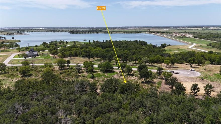 1.85 acres tucked along the hillside of Lake Halbert with peaceful water views and the perfect setting to build your dream retreat. Wake up to the lake, spend your days on the water, and unwind by the fire as the sun sets—this is the lifestyle you’ve been looking for.

Located in a gated, amenity-packed community with a private boat ramp, dock, resort-style pool, fitness center, and clubhouse—plus it’s short-term rental friendly, giving you the option to turn your getaway into an income-producing property. ??

Just minutes from Corsicana, you get the charm of small-town living with easy access to shopping and dining. Big space, lake views, and endless potential—come see it for yourself! ???