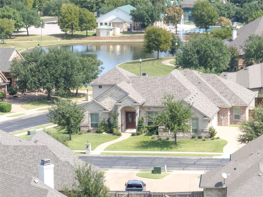 Enjoy Executive Style Living in this exquisite Twin Rivers Subdivision located in Woodway TX. Minutes from Baylor University, Baylor Scott & White Medical Center and Industrial Park. This home is located in the beloved Midway ISD and South Bosque Elementary School area. Twin Rivers has it all, including a private golf course, community pool, tennis courts, park, fitness room, club house, a recreational center for parties and pickleball courts. This executive home features 4 bedrooms, 3 full bathrooms and 2 half bathrooms, a private office downstairs, and a hobby bonus room upstairs with a half bathroom. Twin Rivers Lake can be seen from the balcony as you bask in the orange rays of the beautiful sunrise. You will notice the home is built with high quality materials, granite countertops, hardwood flooring, and wrought iron stair railing. The open concept feature allows for plenty of room to entertain. The open view of the kitchen, living, dining and breakfast area makes for a large space to mingle. The lot is oversized at .33 acres and includes a privacy wood fence. Other oversized features include a 3 car garage to easily park your vehicles and golf cart! If you are searching for high ceilings, oversized rooms, large lot, fireplace, 3,533 sq. ft. of living space, an office and a separate bonus room upstairs, this place is for you. The irrigated landscaping is kept immaculate with St. Augustine grass making it easy to ground your feet anytime without any pricklies! If you enjoy gardening, there is more than enough room to turn this backyard into your ideal flower, plant or vegetable garden. Last, the stove features 5 gas burners to create those special entrees with amazing aromas not typical with electric burners. Other kitchen features include a double oven, convection microwave, dishwasher, disposal, spice racks and lots of space for pots, pans, glasses etc.. Don’t wait to secure this one of kind exquisite home in Twin Rivers now available.