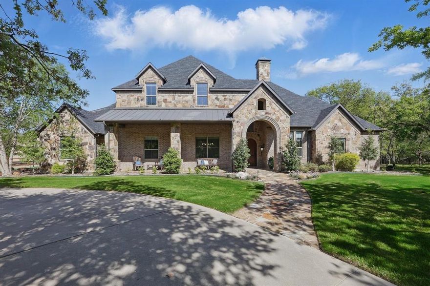 Experience true comfort at this stunning Double Oak property spanning 5 acres of trees, pasture, and paddocks, featuring an elegant updated home,  screened porch, flagstone patio, outdoor cabana, pole barn, pony barn, private well, and gated entrance with a call box. Every detail has been thoughtfully curated by the owners, resulting in a fabulous retreat.

The 2021 house renovation seamlessly blends modern design with everyday functionality. Enjoy morning coffee on the east-facing patio while watching the ponies play in the pasture. The specialized utility room makes chores like laundry and dog bathing fun! Happy hour is the happiest in the outdoor cabana, enhanced with chandeliers, a cozy fireplace, and a pizza oven. As the day ends, watch the sun set on the front porch and relax with a movie in the media room. Each bedroom offers a tranquil escape with its own beautiful bathroom. Life here is truly wonderful!

In addition to a triple-attached garage, the property includes a 40 x 50 metal pole building with foam insulation, two RV-sized overhead doors, a workbench, and a storage loft. The 1-acre pasture is Ag Exempt.

Children can attend LISD Flower Mound Elementary, Downing Middle, and Marcus High Schools. Check the documents section for more information about this exceptional property.