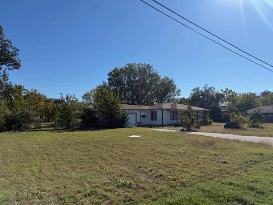 HUGE LOT!! One of the largest lot sizes in the area. Welcome to a rare opportunity in the heart of Springtown - this commercial building is nestled on a generous 0.34 acre parcel in Parker County. This flexible, single-story structure offers 1,243 sq ft of versatile interior space, ideal for a wide range of retail or service business ventures. This is a great investment property.

This property stands out due to the strategic location positioned on N. Main St which has good local traffic and visibility in Springtown. You are also, not only, buying a building; you're acquiring valuable land in a central location, which could appreciate or be redeveloped.