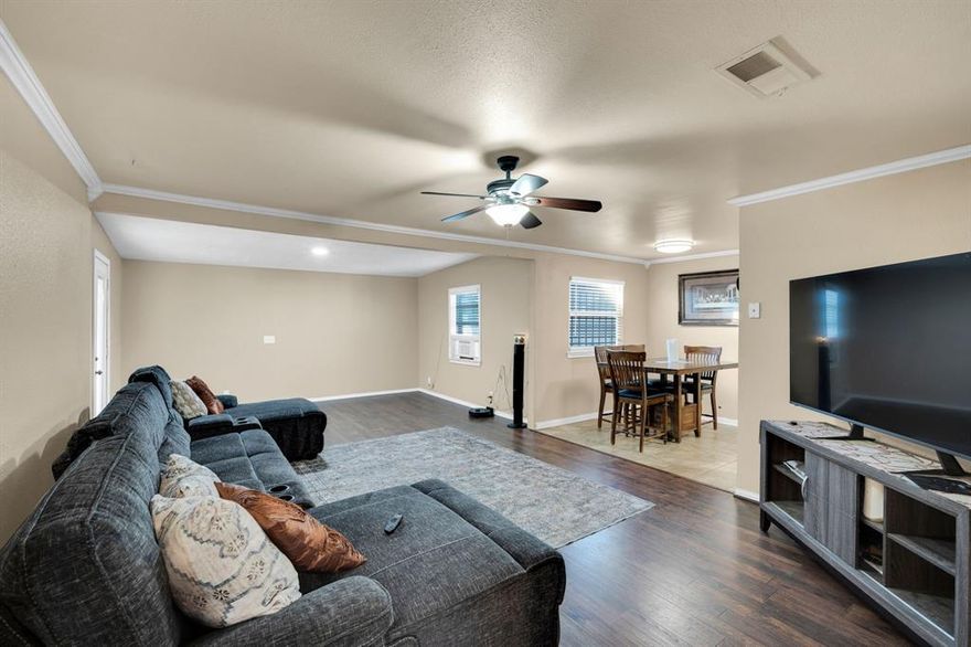 Charming & Move-In Ready Near Downtown Fort Worth! Welcome to 4916 Eastover Avenue, a well-maintained single-story home offering spacious living areas and thoughtful updates just minutes from Downtown Fort Worth. This 3 bed 2 bath 2 car garage home features an open-concept living and dining area with wood-look flooring, crown molding, and abundant natural light. The kitchen includes granite countertops, stainless steel appliances, tile backsplash, and ample cabinet space. Bedrooms are generously sized with ceiling fans and updated finishes throughout. Bathrooms feature granite counters and tiled surrounds for a clean, modern touch.  The family room has been recently extended into the previous den make a single large living room.  Enjoy a large backyard with mature trees and plenty of room for entertaining, pets, or future outdoor upgrades. The two-car garage and wide driveway provide ample parking and storage. Conveniently located near major highways, shopping, dining, and Downtown Fort Worth — this home offers comfort, space, and accessibility at an excellent value. Schedule your showing today!