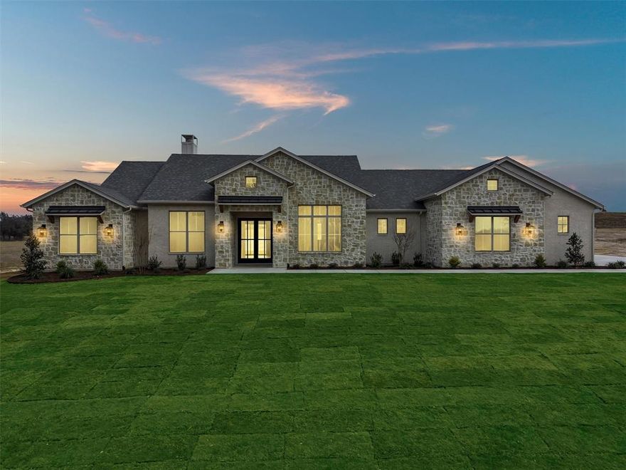 Located in Granbury's newest luxury community of Stewart Ranch, this exceptional new construction by SWP Custom Homes delivers high-end craftsmanship, intentional design, and the kind of finish-out you simply do not see every day.

The exterior makes a statement before you ever walk inside. Once through the doors, wide-plank wood floors, vaulted ceilings with beam detail, and natural light immediately set the tone. The living room is anchored by a striking stone gas fireplace and opens seamlessly to a kitchen that was built to impress.

GE Café appliances, a gas cooktop, custom cabinetry with gold hardware, designer lighting, and a spacious butler’s pantry elevate this kitchen beyond ordinary. It is functional, refined, and designed for both entertaining and everyday living. The dining space flows effortlessly off the kitchen, creating a natural gathering place.

A private office or study provides flexibility for work or quiet retreat, while a well-designed mudroom adds practical organization without sacrificing style. The split-bedroom layout includes four bedrooms, with a Jack-and-Jill bath thoughtfully connecting secondary rooms.

The primary suite stands out with its vaulted ceiling and a spa-inspired bath that feels both expansive and serene. Clean lines, upscale finishes, and balanced design create a space that feels luxurious yet livable.

An underground propane tank and quality construction throughout reflect the attention to detail that defines every SWP Custom Homes build. As most people have said walking through an SWP Custom Home...It just feels different.

Offered at $879,000, this is an opportunity to own a true luxury home in one of Granbury’s most promising emerging neighborhoods.