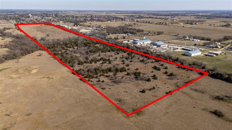 Fantastic location in Grayson County. This acreage sits within Collinsville, Tx ETJ and is a prime location for a residential development.  The property is currently Ag exempt.  Gently sloped topography with beautiful trees along the wet weather creek allowing for space to create a beautiful Green space and park area for your development. Both water and Sewer lines run along the Northern property Line at Humm Street. The City of Collinsville have been very receptive to development ideas for this property and have a pro growth mindset. Seller has development concepts for review. Come develop and sell the lots, or develop and build.  Over 4100 Feet of Union Pacific Rail on the Eastern Boundary for potential rail access. Great location and investment with the continued growth in Grayson County and the North Texas region.