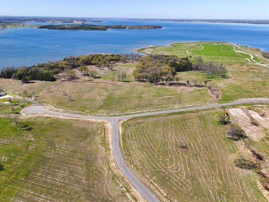 Listing Price is BELOW the seller's acquisition price! Bois d'Arc Lake Opened to the Public on April 17, 2024 and the Shores at the Peninsula now has paved roads. Build your dream lakefront home at 330 Lakewood Lane in The Shores at Peninsula on the new Bois d'Arc Lake! Take a scenic evening walk down to the lake and enjoy the sunset as you look to the west.  Discover community activites like pickle ball courts, dog walk, and entertaining friends and family at the existing multi-million dollar clubhouse.  There is a putt-putt course and an infinity pool for endless fun and relaxation.  This is a gated community with all the exceptional standards you would come to expect from this nationally recognized developer. The current development rules allow for short term rentals with some light restrictions. Choose your own builder and build on your timeline! The excitement of the new Bois d'Arc Lake is increasing daily! Come see this one of a kind lot today!!