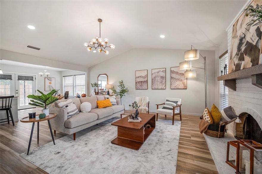 This superbly renovated residence boasts a contemporary open-concept design, featuring 4 spacious bedrooms and 2 pristine bathrooms, making it a perfect family abode. The expansive living room and dining area, create an ideal atmosphere for hosting gatherings and making memories. The fresh, neutral paint throughout the house provides a modern canvas to personalize your new home. Enjoy the benefit of living within walking distance to schools and having access to picturesque bike trails, promoting an active and balanced lifestyle. Whether you prefer cycling or a leisurely stroll, the local trails offer scenic routes to explore and enjoy.