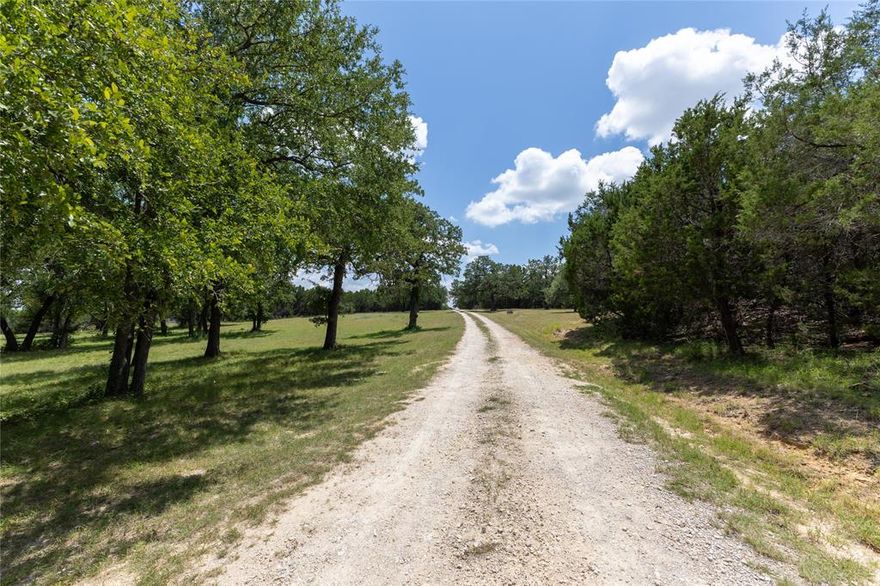 NO KNOWN Restrictions on this approximately 80 acres on the west end of Somervell County. This secluded country cabin is tucked away amongst beautiful Oaks and Cedars.  Large bedroom currently serves as a bunk room. The kitchen, dining, and living areas are open-concept, providing a large area for gatherings. The fenced yard around the cabin keeps those cows out! Enjoy the outdoors, being tucked away from neighbors and noise!  Take a little drive through the pasture to get to the stocked pond with a dock! The seasonal White Bluff Creek runs though the property.  Currently running cattle for the AG-EXEMPTION!  Well water and United Co-Op Electric are on property.  This 79.77 acres is comprised of 2 tracts (39.77 & 40 acres). See the aerial for boundaries.  Property address is Bluff Dale, in the exceptional Glen Rose ISD. If you want to venture to town, there are lots of dining and shopping options in nearby Glen Rose. Also there are recreational activities such as Squaw Valley Golf Course, Dinosaur Valley State Park, Dinosaur World, Fossil Rim, the Historic Downtown Square.
Cross-Listed: 
- 39 acres & house: MLS# 21015347
- 40-acre tract: MLS# 21014205