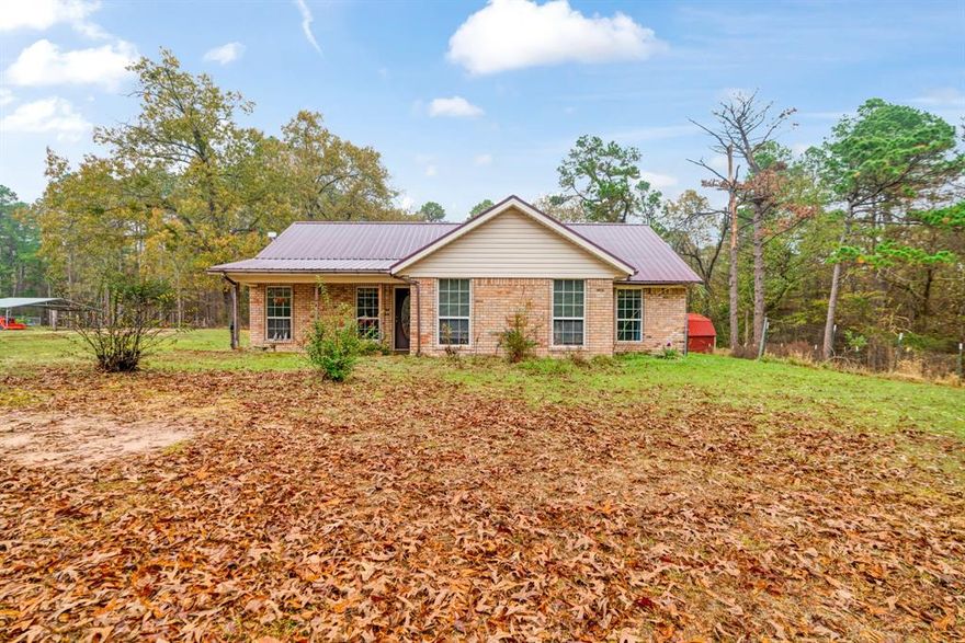 Charming Country Brick Home on 10 Acres Near Lake Pat Mayse Arthur City, TX
Discover peaceful country living with this 3-bedroom, 2-bathroom brick home on 10 beautiful acres in Arthur City, Texas. Offering approximately 1,533 sq ft of comfortable living space, this property delivers the perfect blend of privacy, open land, and charm, ideal for anyone seeking a slower, more relaxed country lifestyle.

Step inside to a bright and inviting living room featuring tall ceilings, generous natural light, and a welcoming layout. The rustic-style kitchen offers warm country character with plenty of room to customize and make it your own. Each bedroom provides comfortable space and views of the surrounding acreage, giving the home a light, airy feel.

The 10-acre setting offers endless possibilities, build a shop, start a small hobby farm, enjoy wide-open views, or create the peaceful retreat you’ve dreamed of. Property includes a tractor with purchase. Located just minutes from Lake Pat Mayse, this property gives you easy access to some of the area’s best fishing, boating, camping, and outdoor recreation. Whether you're looking for a weekend getaway or a full-time homestead close to the lake, this location is hard to beat.
If you're searching for space, privacy, and room to grow with the added bonus of nearby lakeside activities, this Arthur City country home checks all the boxes.