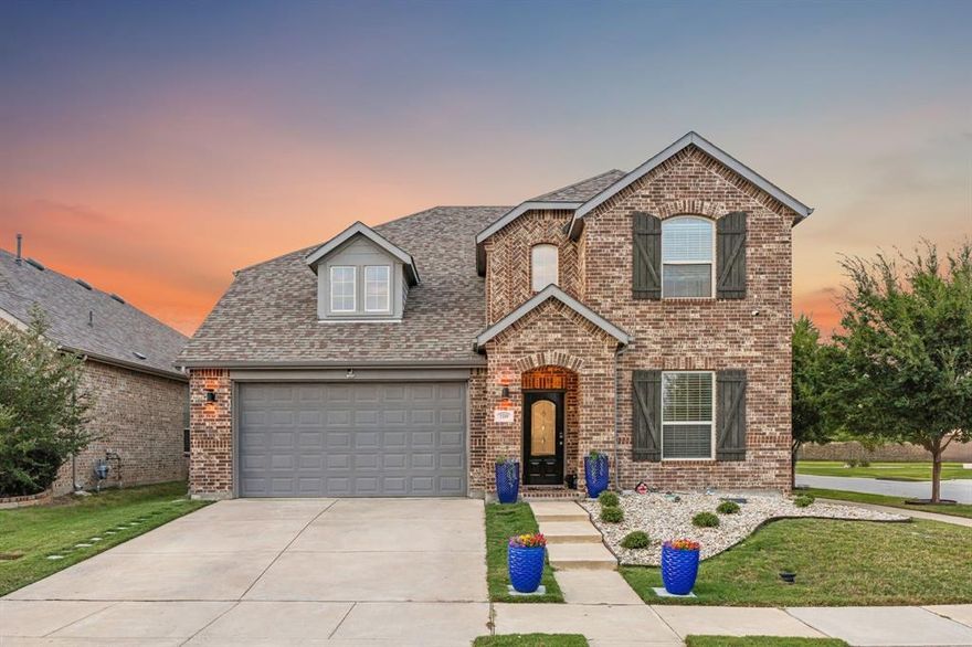 Discover luxury living at its finest in Argyles' most desirable neighborhood, Harvest! With updates valued over $200k this meticulously maintained 4-bedroom, 3-bath Highland Home home offers the perfect blend of elegance, comfort, and functionality. From the moment you arrive, the professionally landscaped yard and impressive curb appeal set the tone for what’s inside. Step into a light-filled foyer that opens to a formal dining room and a spacious living room with soaring ceilings. Throughout the home, you’ll find designer touches and finishes. The chef’s kitchen is a true showstopper, featuring sleek cabinetry with hardware, granite countertops, center island, stainless steel appliances, a gas cooktop range and modern lighting. Retreat to the luxurious primary suite with a spa-inspired ensuite bath with double vanities, a large walk in shower and a generous walk-in closet. Upstairs, enjoy a large game room and an additional adjacent living area and two bedrooms, plus full bathroom. Step outside to your own private resort-style paradise. A custom-built covered patio overlooks a stunning salt water heated pool with a mesmerizing waterfall feature, and a Texas-sized roofed patio with outdoor counter, storage cabinets and built in gas grill.  Surrounded by low maintenance landscaping, LED color changing patio lighting and enclosed by a wood fence, this backyard oasis offers the ultimate in privacy and tranquility—perfect for hosting lively gatherings or enjoying peaceful evenings. Additional features include a storage shed and numerous upgrades: 2022 Tankless water heater, 2021 
SALT WATER Pool, 2020 Deck masters double covered Patio Roof, 2022 RainSoft whole house water softner system, 2021 Outdoor kitchen area with gas grill.  Zoned to Argyle ISD this exceptional home truly has it all!  Community amenities include a scenic lake with kayaking and fishing, parks, neighborhood pools, coffee shops and more!