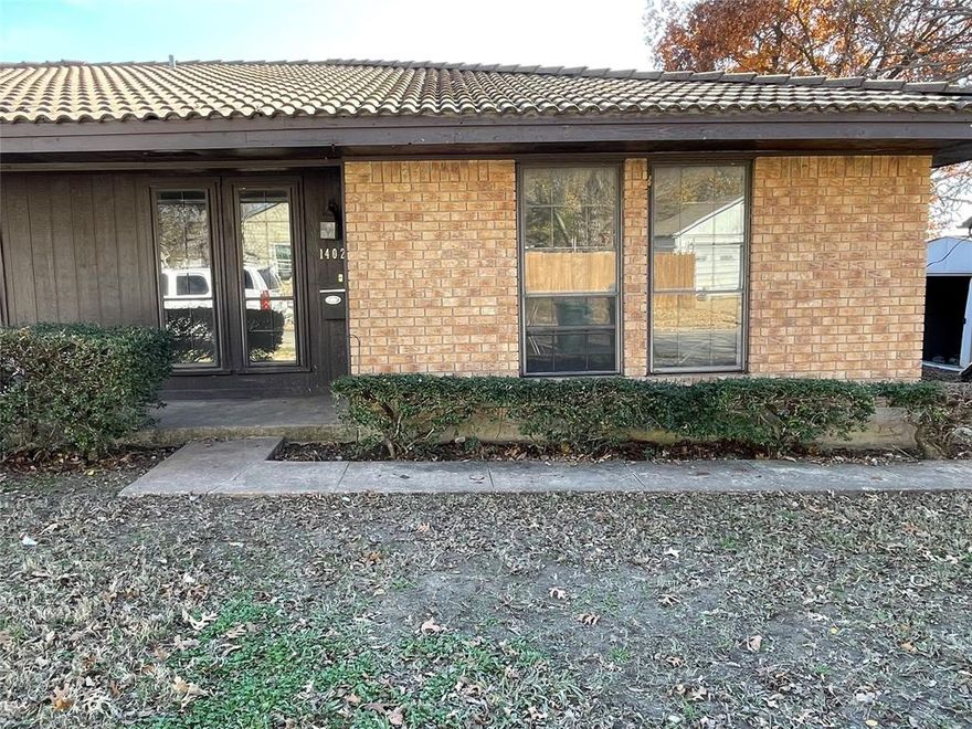 Recently renovated West Sherman brick duplex featuring 2 bedrooms, 1 bathroom with new paint and carpet throughout. Ideal location offering easy access to shopping, schools, and HWY 75. The kitchen is equipped with a fridge, dishwasher, and oven, along with space for a full-size washer and dryer. This clean property is move-in ready, with yard maintenance included in the rent. Online applications require a $40 fee per adult applicant for credit and background checks. Rent is $1100 with a $1100 security deposit.