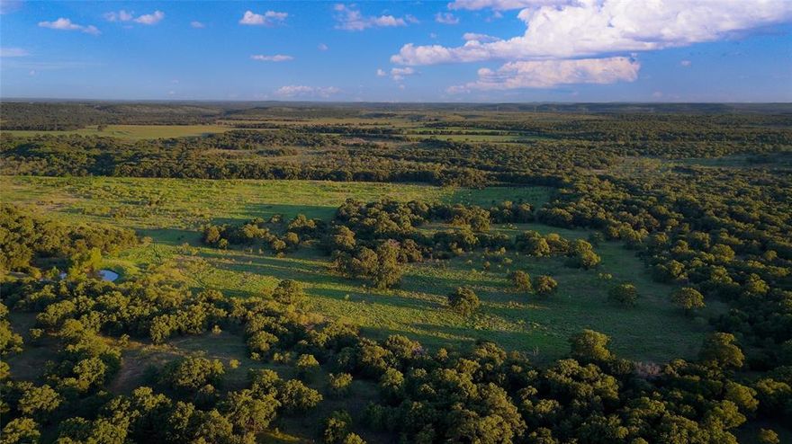 Beautiful topography, diverse landscapes, and trophy-quality wildlife await on this 149.39+- acre ranch in Northern Jack County, an area known for its rugged hills, big skies, and some of the best hunting in North Texas. This property blends the charm of rolling pastures, scattered hardwoods, and brushy draws, creating a uniquely varied habitat that supports deer, turkey, dove, and other native wildlife. Two ponds and a small stretch of Turkey Creek keep the land well-watered, while the mix of cover and open areas provides the ideal balance for both game and grazing.

When you cross the cattleguard, you immediately sense you’ve left the ordinary behind. Secluded and private, this acreage has been lightly hunted, and the photos speak for themselves—there is true trophy potential in the whitetail deer here. Four quality blinds and six feeders convey with the sale, making this a turnkey hunting destination ready for the 2025 season.

Northern Jack County offers more than great hunting—it’s a place where neighbors are measured in acres, not feet, and weekend traffic means a few pickups headed to the feed store. You’ll find scenic drives, historic small towns, and wide-open country that feels a world away, yet you’re still within a reasonable drive of the Metroplex. Electricity is close by, and water well data from neighboring tracts is strong, making future improvements straightforward. Whether for recreation, a private retreat, or a long-term land investment, this property is ready to deliver on every front.