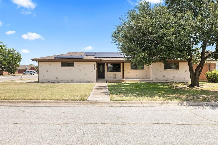 Well-maintained and move-in ready, this charming corner-lot home is located just minutes from downtown Fort Worth and all the surrounding shopping, dining, and entertainment the city has to offer. The updated kitchen and bathrooms bring a fresh, modern touch, while the versatile bonus room offers additional space to create a home office, playroom, or hobby area. With two spacious living areas, there’s plenty of room for family gatherings or entertaining guests. Ample street parking, a convenient carport, and energy-saving solar panels add to the home’s appeal. A great location paired with thoughtful updates makes this home a must-see!