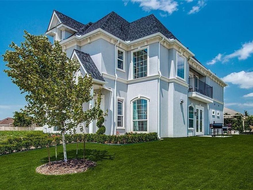 MOTIVATED SELLER, BRING ALL REASONABLE OFFERS ~Welcome to a truly exceptional living experience in the prestigious, French-inspired community of Provence Luxury Patio Homes in McKinney. This stunning 2-bedroom, 2.5-bathroom patio home was the original Model Home, featuring personalized, custom-designed interiors that redefine luxury living. Every detail has been curated for an elevated lifestyle. Step inside to discover rich wood floors, dramatic 7-inch baseboards, and deep crown moldings throughout. The kitchen is a gourmet's dream with marble countertops, 42-inch custom cabinetry, and top-of-the-line Bosch stainless steel appliances. Entertain effortlessly with the sophisticated in-wall wine bar and rack. The versatile office space is perfectly suited for a 3rd bedroom.
Enjoy the beautiful Texas weather with a large pergola on the main patio, two additional side patios, and two balconies. The front and two side yards are conveniently fenced in. Best of all, the HOA maintains the yard, giving you a chore-free outdoor experience.
A spectacular grand curved staircase accented by elegant wall sconces, leading to a truly decadent Master Suite. You'll also appreciate the practical touches like the custom mud cabinet near the entrance.
Located for ultimate convenience and highly desirable Frisco ISD schools, you'll have easy access to major thoroughfares like 121 and 75. Step out to enjoy the community's sculpture garden and walking paths. The home is adjacent to the 80,000 SqFt APEX Center, offering swimming pools, tennis, youth sports, parks, trails, a library, and more—putting world-class amenities right at your doorstep.