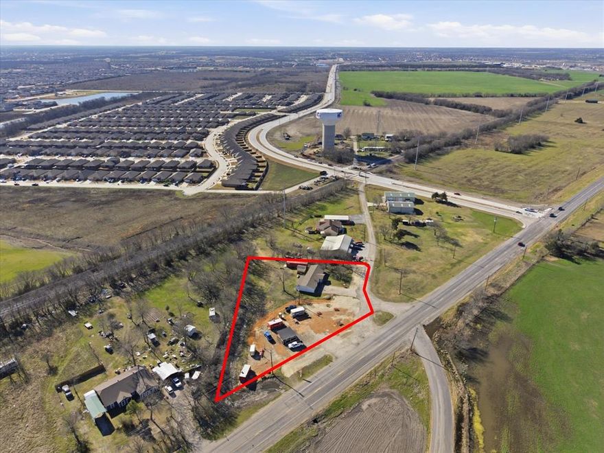 Exceptional opportunity to acquire this 1.1-acre tract ideally positioned just north of FM-2642 on State Highway 66, with over 200 feet of highway frontage. This high visibility site benefits from a daily traffic count of 10,000+ vehicles, making it a strategic investment within a rapidly expanding community. Just minutes from Buc-ee's, Walmart, Lowes and other major retailers; Royse City's historic Main Street; and the future Royse City Town Center development at I-30 & FM-2642 with highly anticipated anchors. This unincorporated parcel is located outside city limits and the ETJ, with no floodplain, allowing for a wide range of development opportunities. The property includes an income generating, fully leased 7-space food truck court with electric and water connections. There is also a residence which is currently leased as retail (interior photos are from before it was leased). Current income: $6150 monthly, $73,800 annually. This property is positioned for long-term growth and flexible use potential for investors looking to capitalize on this area's explosive expansion.