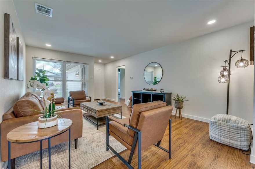 Fully renovated and move-in ready, this beautifully updated home blends modern upgrades with timeless character. Inside, you’ll find original hardwood floors that add warmth and charm throughout the main living areas, complemented by fresh finishes and an open, inviting layout. The stylish kitchen features white cabinetry, stainless steel appliances, quartz countertops, and a modern tile backsplash, flowing seamlessly into the dining and living space...perfect for everyday living or entertaining. The spacious primary bedroom offers comfort and privacy, while the additional bedrooms provide flexibility for guests, a home office, or family living. Both bathrooms have been thoughtfully updated with modern fixtures and tile work.  Step outside to a large backyard with a covered patio, ideal for relaxing or hosting gatherings. The property also includes a separate shed outbuilding, providing excellent storage, workspace, or hobby space. Located in an established neighborhood with convenient access to major highways, shopping, and dining, this home offers the perfect balance of modern updates, classic charm, and functional outdoor space.  Preferred lender incentive available. Buyers who choose the seller’s preferred lender may receive a lender credit toward closing costs. Contact listing agent for details.