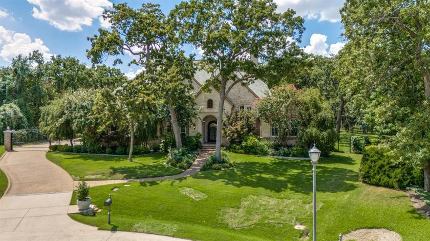 Extraordinary home in Southlake with gorgeous landscaped grounds, fruit trees in back, hardwoods.  Gorgeous pool and spa, outdoor living and cooking area.  Separate 900 sq.ft. shop in back not in sq.ft.  Note all the new built-in drawers, cabinets and accessories in pantry, laundry room and primary closets.  All built-ins in office study.  Epoxy on garage floors and built-in cabinets in 4 car garage.  3 bedrooms on main level. 3 bedrooms upstairs with game room and media room.  Gym on main level.  Gourmet kitchen has Miele Automatic built-in coffee maker, 2 dishwashers, built-in refrigerator-freezer, commercial grade Viking 6 burner stove with grill and 2 ovens.  Smart Home Features.  Full House Generator.  Laundry center has LG Styler steam closet designed to refresh, sanitize and deodorize clothing.