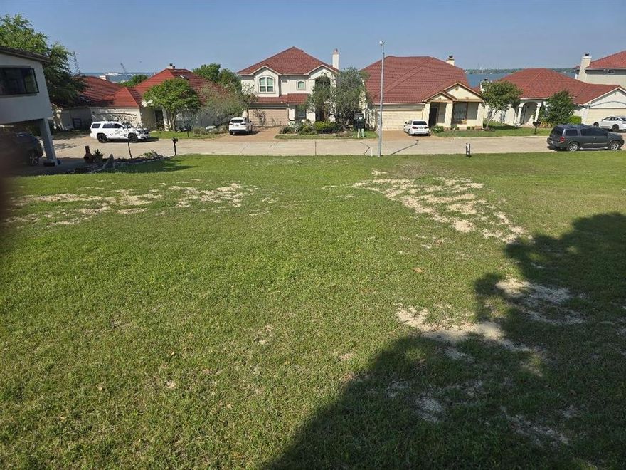 One of the  last empty & biggest lots remaining in much desired Lakeside Village  community adjacent to Lake Ray Hubbard and the Marina. 
Lot is located on the East side of the community where the newer built homes are located. A potential multi-level single-family residential building will have a view of the lake from the top level. Community Amenities include: 9-Hole Par 3 Golf Course, Clubhouse, Pool, Basketball & Pickleball Court, Tennis Court, 2 Playgrounds, Pond.
Lakeside Village is exactly 22 miles from downtown Dallas and minutes away from The Harbor Rockwall shopping, dinning, and boardwalk. The Future spectacular & ambitious Sapphire Bay  project will also be within minutes from Lakeside Village on the Rowlett side of the lake.