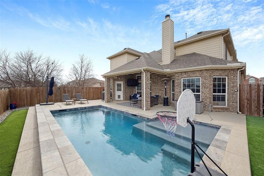 Spacious 5-bedroom home with pool on a quiet cul-de-sac in Fort Worth, offering 3,149 square feet, a private backyard retreat, and exceptional value in the highly desirable Presidio neighborhood.

Welcome to 9304 Tunilla Court — thoughtfully designed for both everyday living and effortless entertaining. Rich wood flooring runs throughout the main living areas, adding warmth and continuity across the first floor. The expansive living room features soaring ceilings, abundant natural light, and a striking stone fireplace, seamlessly connecting to the kitchen and dining areas.

The kitchen offers generous counter space, ample cabinetry, stainless steel appliances, and a breakfast bar overlooking the living room — ideal for gathering and daily functionality. A dedicated home office at the front of the home provides a quiet work-from-home setup or study space. A half bath and laundry room complete the main level.

The primary suite is privately located downstairs and serves as a relaxing retreat with a spacious bedroom and ensuite bath featuring dual vanities, soaking tub, and separate shower.

Upstairs, a versatile gameroom loft anchors four additional bedrooms. Two bedrooms share a Jack-and-Jill bath, while the remaining bedrooms offer flexibility for guests, hobbies, or additional workspace.

Step outside to a low-maintenance backyard oasis featuring a covered patio, turf play area, and sparkling pool — perfect for summer entertaining, outdoor dining, or relaxing evenings at home.

Located on a premium cul-de-sac lot near schools, shopping, dining, and major commuter routes, this home delivers space, privacy, and lifestyle in one compelling Fort Worth opportunity.