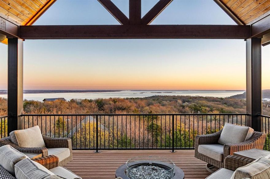 Welcome to one of the finest homes ever offered on Lake Texoma.  Located at 220 Oak Hills Drive in the highly desirable, wooded, and gated community of Oak Hills Estates, this extraordinary, turnkey, lakeview property offers luxury, privacy, and breathtaking panoramic views.

Spanning 4,491 square feet, the home features 5 bedrooms and 4.5 bathrooms, thoughtfully designed with high-end custom materials and exceptional craftsmanship throughout.  Expansive Kolbe windows and doors frame spectacular 180-degree views of the lake, filling the home with natural light and seamlessly connecting indoor and outdoor living.

The interior showcases hand-scraped hardwood floors, a chef's kitchen equipped with GE Monogram appliances, and refined architectural details that elevate every space.  A Galvalume standing-seam metal roof adds both durability and timeless style.

Designed for gathering and relaxation, the property offers multiple outdoor living areas, perfect for entertaining family and guests or enjoying peaceful solitude while overlooking the water.  An oversized garage provides ample space for vehicles, boats, and all of your lake toys.

Whether you're searching for a luxury lake retreat, full-time residence, or corporate getaway, this exceptional property offers a rare opportunity to own a truly remarkable home on Lake Texoma.

Convenient to Tanglewood Resort and Golf Course, Highport Marina, historic downtown Denison, and Choctaw Casino.