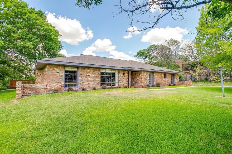 Welcome to Fort Worth’s hidden gem, Tejas Trails! Offering country feel with city convenience.This spacious 3-bed, 2-bath, 2-car garage home sits on an oversized ~0.69-acre lot situated on a quiet street. This area offers a peaceful, semi-rural setting with quick access to shopping, dining, and major thoroughfares. Inside, you’ll find two living areas, one with a cozy wood-burning fireplace and built-in desk, plus a well-laid-out and updated kitchen with breakfast area, formal dining, and generously sized bedrooms. The oversized utility room has space for a freezer or extra storage. Enjoy the huge, landscaped backyard from the back deck. With a little vision, love and your personal touch, this home is the perfect canvas to create your dream space - wonderful bones and plenty of opportunity to update, customize, and make it truly your own. A rare find with room to breathe—don’t miss this opportunity in a sought-after and tucked-away part of west Fort Worth!