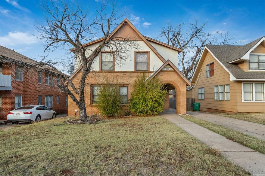 Just outside the sought-after Historic Floral Heights West District, this 1925 Craftsman home is bursting with architectural charm and incredible potential. From the moment you step onto the classic covered front porch, you’ll notice the original character preserved throughout including solid wood doors, wood-wrapped windows, rich Craftsman trim, and true hardwood floors that bring warmth and history to every room.

Inside, you’ll find generous living spaces including a large living room with wood-burning fireplace, a formal dining room with beautiful natural light, and a flexible office space. The updated kitchen features stainless appliances and modern finishes, and both bathrooms have received recent updates, giving investors a valuable head start on improvements. Upstairs, dormer windows add charm and functionality to the spacious bedrooms.

Outside, the deep backyard is terraced beautifully into the hillside, offering unique landscaping potential and multiple outdoor living or garden zones. Covered parking, an outbuilding, and a rear entrance add convenience for future layouts or redesigns.

This property is being sold as-is, and the seller will make no repairs, making it an excellent opportunity for investors, or savvy buyers who are not afraid to put in the sweat equity before moving in.

Bring your vision and unlock the full possibilities of this character-filled Craftsman in a prime central Wichita Falls location.