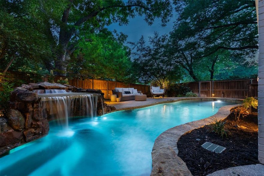 Perched atop a hill in Fort Worth’s Ridglea neighborhood, this elegant home offers timeless design, thoughtful upgrades, and a backyard oasis with a heated pool, waterfall grotto, and shaded pergola, making it a year-round retreat. Inside, you’ll find hand-scraped wood floors, plantation shutters, a chef’s kitchen with 6-burner range, icemaker, and beverage fridge, plus a dramatic stone fireplace and expansive upstairs primary suite. Surrounded by mature trees and moments from Ridglea Country Club, Camp Bowie, Clearfork, and Waterside, the location is both peaceful and connected. City infrastructure improvements (new water, sewer, and roadwork) are underway and expected to wrap by late 2026, giving buyers with vision an opportunity to secure this beautiful home now, with potential equity upside when the project is complete.