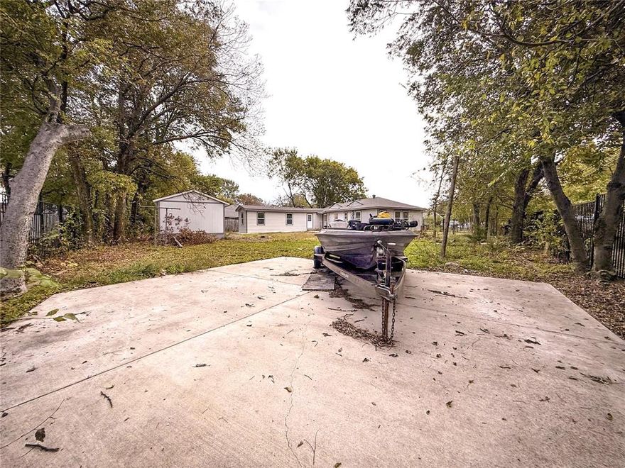 READY TO GO! Huge Opportunity Duplex Set-up ideal Generational living or Roommates. Seller leased 1 side for $1,500 & 1 side of $1,800 on year lease! Tax savings around $4,600 a year!This corner lot w. Alley access on over a quarter-acre offering 2 Private Entrances, 2 Kitchens, 2 Separate backyards, 2 Separate Full Bathroom, 2 Primary Rooms, & 2 Separate Driveways to fit around 8 Vehicles. 1 Large Flexible Structure to be 3rd rental-hobby shop-extra storage on concrete slab! Flexible ownership—whether you move in or lease it out, the rental market shows strong backing. New Large Windows throughout, Newly Reinforcement Foundation w.New Foundation for addition, Completely New Electrical system, New pipes in existing structure, New plumbing in addition, New Roof overlay, Newer Water heater, New Iron Tall fencing, Recently poured Driveway & sidewalk installation, New Paint, New Drywall, New can lighting, 2inch hardwood floor is the original vintage wood, NO Carpet. You can operate 30+ day mid-term furnished rental. Walk to Library, Grocery stores, Post Office, Convenience store, Local restaurants, Parks! Mature older neighborhood: bigger lots, mature trees, established streets. Transit Center (DART Rail & Bus Hub) — less than 10 minutes away, providing direct rail service to Downtown Dallas and convenient bus routes throughout Southeast Dallas. Quick access to I-635 (LBJ Freeway), I-20, and US-175 connects residents to major employment centers in 15–25 minutes.