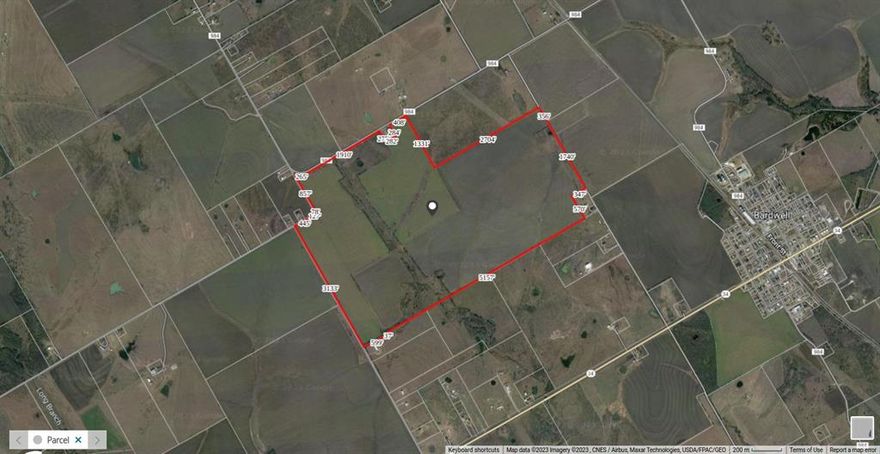 Large, 462.563-Acre tract bounded by Roach Road, FM 984, Bacak Road, and E B Lane - please see the photos.  BUYERS, PLEASE NOTE: Property condition is UNKNOWN, utilities are UNKNOWN, easements are UNKNOWN.  No survey available, schools to be verified by buyer.  No disclosures available.  Property may be under agricultural lease, crops will be retained by lessee and not convey.  Real estate signs may or may not be present.
