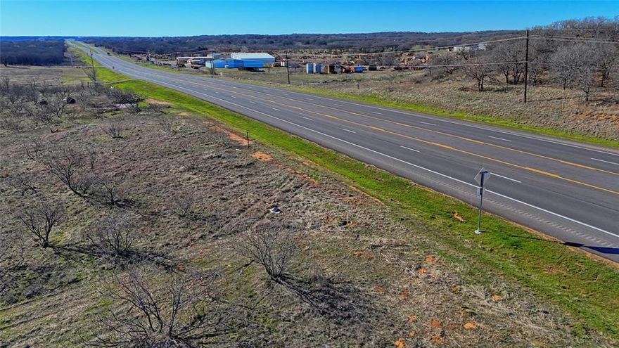 This 8.98 acre piece of land has excellent highway frontage on Highway 82 in Nocona, Texas. This tract of land offers mesquite trees and native grasses making it a relatively low-maintenance property with a natural, rustic charm. The potential for both commercial and residential use adds versatility to the land. Nocona is a quaint town known for its rural beauty, outdoor recreation opportunities, and small-town charm. The surrounding area offers scenic views, rolling hills, and peaceful landscapes. Whether you’re looking to build a rural home or retreat, come take advantage of the peaceful surroundings and possibilities.