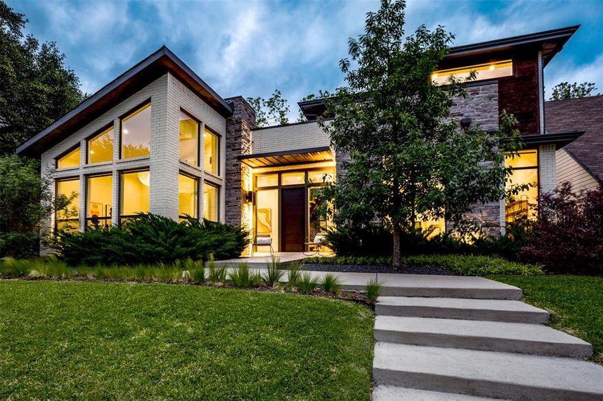 Set on an enchanting street in Lakewood Hills, this amazing contemporary home features large expanses of glass that focus views toward the stunning architect-designed pool & lush backyard setting while infusing the interiors with an abundance of natural light.

The kitchen, with its large sliding doors, serves as the heart of the home, offering a fluid transition between interior & exterior spaces. The open floor plan elevates the overall living experience with soaring high ceilings, white oak flooring, walnut cabinetry, designer lighting fixtures, & a stunning floating staircase. En suite bathrooms for each bedroom, ensure both comfort and privacy for every member of the household.

This exceptional must-see property epitomizes contemporary-family-living with its blend of modern design, luxury and functionality. The premium Lakewood location is walking distance to Lindsley Park, the YMCA, & the Santa Fe Trail as well as being in the Lakewood Elementary attendance area. What a gem!