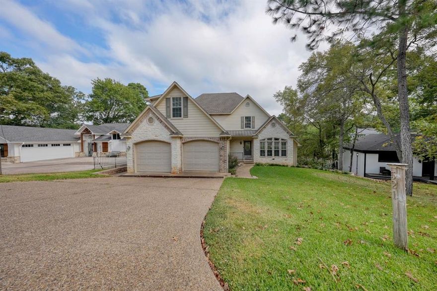 Welcome to your stunning lakefront retreat in Hideaway, TX! This 3-bedroom, 3.5-bathroom home offers luxury and tranquility with breathtaking water views. Spanning 3,214 sq. ft., it’s perfect for relaxation and entertaining.

Step into the open floor plan, featuring a grand living area with vaulted ceilings, a cozy stone fireplace, and large windows with lake views. The gourmet kitchen has granite countertops, stainless steel appliances, a large island, and custom cabinetry. The primary suite on the main floor includes a spacious walk-in closet, an en-suite with dual vanities, a soaking tub, and a walk-in shower. Two additional bedrooms provide ample space.

Upstairs, find a versatile bonus room, and on the lower level, another bonus space for your customization. Outside, enjoy an expansive deck, a private boat house, and endless outdoor activities. With gated community amenities like golf, a pool, and more, this lakefront paradise has it all.

Schedule your tour today!