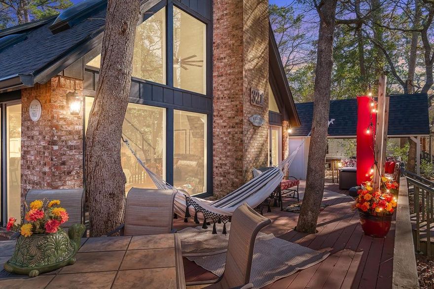 Would you enjoy your morning coffee with a lake view? Is a home with wonderful natural lighting through a wall of windows on your dream home list? Do you want peace of mind that comes from living in a 24 hour gated security community? Does a remodeled, move in ready home sound enticing? Located just across Hideaway’s beautiful, largest, Middle lake, you’ll enjoy peaceful water views, glowing sunsets through the trees, and quick access to fun, just 200 yards from the Lodge, Pools,Beach, and Funtier Park. Whether your days are filled with golf, pickleball, lakeside walks, or simply unwinding, this community delivers with 27 holes, tennis and pickleball courts, two pools, parks, three scenic lakes, a clubhouse restaurant and pro shop. Inside your new home, natural light steals the show. Entertain or relax in the spacious open living space on the main floor that also hosts two bedrooms. Recent updates elevate both style and function, including newer kitchen cabinets with granite countertops, updated appliances, including a gas stove top, and a striking glass staircase that keeps sightlines open to the luxury vinyl plank flooring and large open living space below, Not to mention THE VIEW. The upstairs features a large carpeted bedroom, spacious walk-in closet, remodeled bath with luxury vinyl flooring, and a small office space. You’ll also appreciate the propane gas insert fireplace with remote ignition, five skylights, two newer HVAC units, and a new roof in December 2025. Add in the convenient location, minutes to I-20, roughly two hours between both Dallas and Shreveport, LA, and within 20 minutes to Tyler’s airport and you’ve got the best of both lifestyle and accessibility. Located in Lindale’s award winning schools. This is more than a home. It’s a front row seat to the Hideaway lifestyle, and it’s ready for its next chapter...Yours.