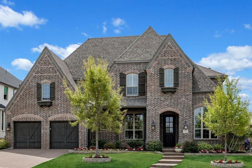 WELCOME TO THIS EXCEPTIONAL 5BR HIGHLAND HOME! Nestled within the highly sought-after Whitley Place community (Prosper ISD) and zoned for the prestigious Walnut Grove HS, this residence sets the standard for opulent living and impeccable design. Perfectly positioned on a  cul-de-sac and designed for both everyday living and unforgettable entertaining, it is a rare opportunity to own a remarkable home that seamlessly blends luxury, comfort, and timeless appeal.  From the moment you step inside, you’ll be captivated by stunning designer lighting, rich wood flooring, and beautifully selected designer tile that elevates every space. The open-concept floor plan creates a seamless flow between the living, dining, and kitchen areas, all bathed in natural light for a bright and inviting atmosphere. At the heart of the home, the kitchen is complemented by a gorgeous butler’s pantry—perfect for hosting and prep space.

The executive study is a true standout, featuring custom built-ins and a hidden closet, offering both functionality and intrigue. A thoughtfully designed mudroom adds convenience and organization to daily life. With 2 bedrooms conveniently located downstairs and 3 upstairs, the layout offers both flexibility and privacy.  Plus, all bedrooms feature ensuite bathrooms jack n jill connecting 2, providing comfort and convenience for family and guests alike. Upstairs, you’ll find spacious secondary bedrooms along w built-in planning desk—ideal for homework stations and remote work. The entertainment options are endless with a dedicated media room and expansive game room, making this home an entertainer’s dream. Step outside to a large covered patio overlooking a pool-ready backyard, offering endless possibilities to create your own outdoor oasis. Whether relaxing or hosting gatherings, this space is sure to impress. Blending luxury, comfort, and thoughtful design, this home has it all—space to live, work, and play in style. NO MUD or PID Tax