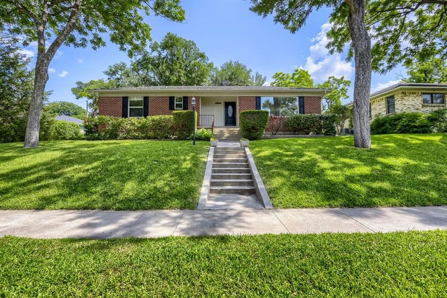 Seller will assist with closing costs or rate buy down through a preferred lender. Beautiful Grand Lochwood home set on a large corner lot facing the greenbelt. This spacious property offers generous room sizes with natural light and views from nearly every window. Updates include the kitchen, windows, Trane HVAC system, and a lifetime steel roof, plus a pleasant sunroom for year-round enjoyment. Original 1958 red oak hardwood floors lie beneath the carpet, ready to be revealed. The home also features a large 2-car garage, carport, and an additional driveway and yard area. With a 485 sq. ft. garage and a beautifully manicured lot with mature trees, this well-kept home is already lovely—and even more stunning with your personal touches.