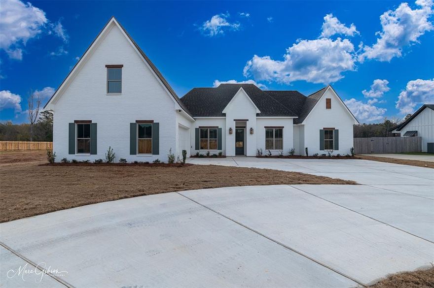 Welcome to Pin Oak Landing! This beautiful home features a striking white brick exterior and a clean, modern curb appeal that stands out! Inside, you'll find an inviting open-concept layout with great natural lighting, beautiful color through out, and a layout designed for effortless living. The kitchen offers stylish cabinetry, ample counter space, an oversized island, and a seamless flow into the living area, perfect for large gatherings. The primary suite provides a comfortable retreat with an ensuite bath and generous closet space, and a beautiful accent wall. The primary bath is your own personal spa, feel like you are on vacation everyday! Enjoy the convenience to schools, I-20, and dining.  Call today this one is one of a kind!