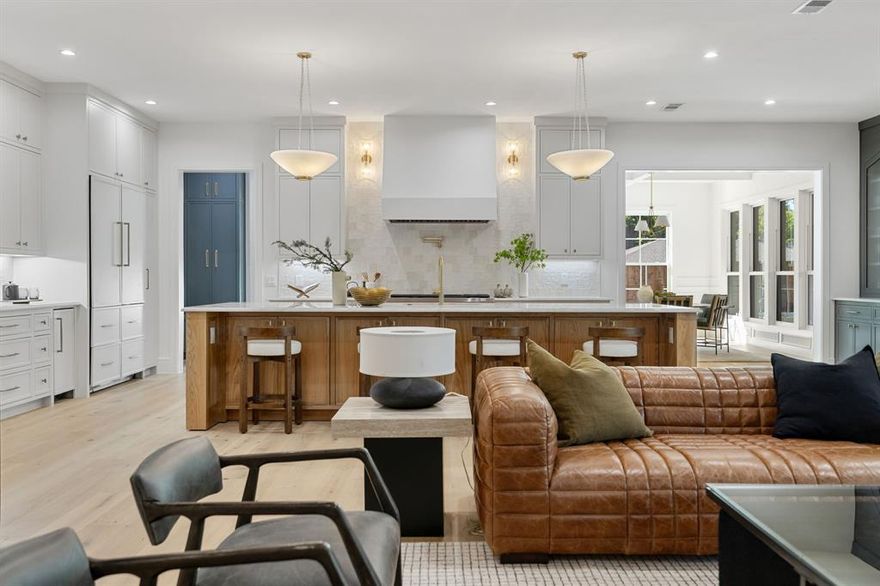 Stunning new construction completed in late 2025 by Shoreline Property Group, ideally located in the coveted private school corridor. This 5 bedroom home offers timeless style with rich paneling and soft light filled finishes throughout. Two bedrooms are located on the first floor and three on the second, each floor also has its own powder bath and living area. The formal dining room overlooks the sparkling pool, while the gourmet kitchen features white oak cabinets, quartzite countertops, a built in bar and scullery. A dedicated office, spacious bedrooms and flowing indoor-outdoor living make it ideal for family and entertaining. Outside, enjoy a covered patio with built in barbecue, pool, and plenty of yard space for kids and pets to play. Conveniently located near St. Rita and Jesuit.