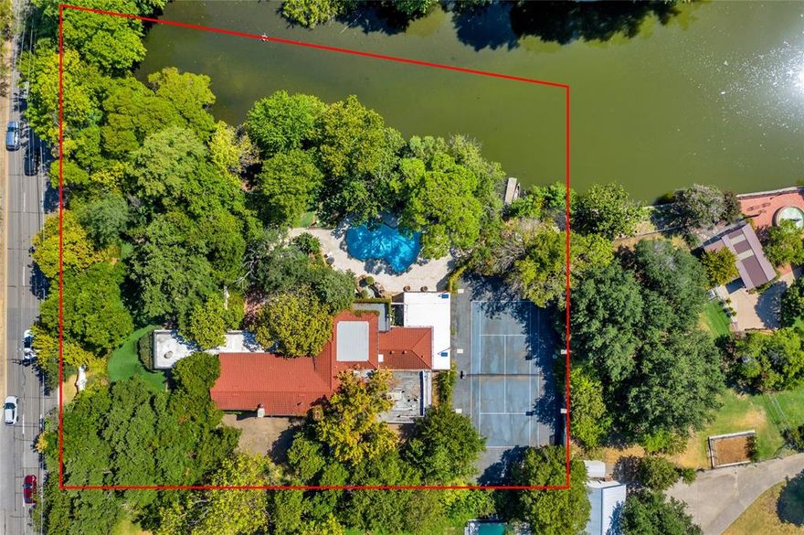 This prime property, located in the prestigious Preston Hollow neighborhood of Dallas, presents a rare opportunity for custom construction on a spacious 1.41-acre gated estate lot situated on a private lake. This exclusive estate lot is nestled amidst a lush landscape of mature trees, creating a tranquil and picturesque setting for a dream estate tailored to your preferences.

Access to this exceptional property is granted through two secure gates, ensuring both convenience and security for its future residents. The existing home is considered to have no value and will not be available for viewing. The true value of this offering lies in the extraordinary land and its serene surroundings.

Centrally located on the prestigious Preston Road, this property enjoys a prime position in the heart of Preston Hollow. Its proximity to the private school corridor, as well as Dallas' finest shopping and dining establishments, adds to the desirability of this location.