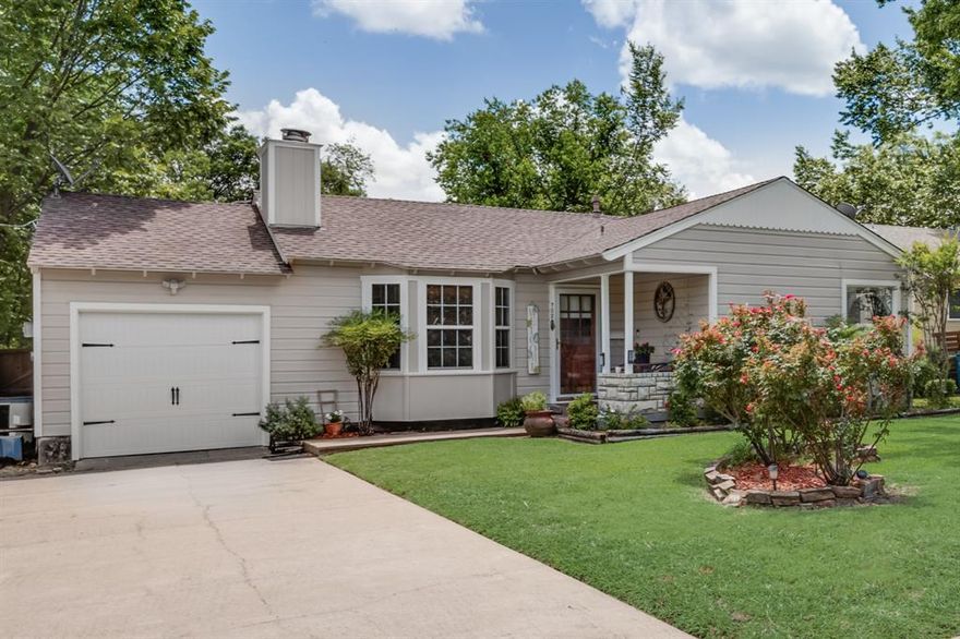 Charming 1950's craftsman style home near downtown Rockwall!  Prime location just steps from downtown.  Close to Goliad St, Hwy 205, Hwy 66, I30, lots of shopping and dining options, entertainment, schools, parks, medical, Lake Ray Hubbard and more.  Well maintained, original 1950's charm.  Great floorplan!  Cozy, inviting living room with a beautiful woodburning stone fireplace and bay windows which provide lots of natural light.  Spacious  dining area.  Generously sized kitchen with lots of cabinets and shelves.  Original hardwood flooring.  Nice sized bedrooms.  One and one-half baths.  Oversized garage with room for lots of storage.  Enjoy outdoor living with a private, beautiful yard with mature trees, an oversized deck and a flagstone patio!  Workshop - shed (8X8) for extra storage, etc.  This immaculate home is move-in ready.  Refrigerator, washer and dryer included!  Highly sought after Rockwall ISD.  Beautiful highly desired neighborhood.  No HOA!