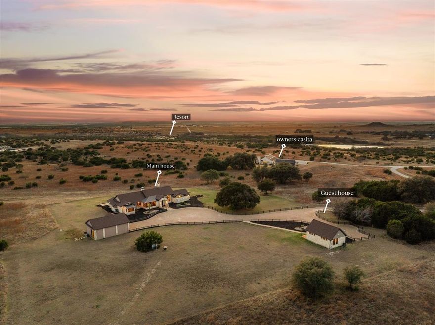 Luxury ranch estate on 50 acres inside the gated 9,000 acre Rough Creek Lodge & Resort community in Glen Rose, Texas. This multigenerational ranch property includes three residences with accommodations for up to 24 guests, ideal for extended family living, entertaining, or corporate retreat use.
The main residence offers 3,535 sq ft with 3 bedrooms and 3.5 baths, large windows with expansive Hill Country views, and elevated finishes. A separate owner’s casita features 2,427 sq ft with 2 bedrooms, 2.5 baths, private garage, and secure safe room. Additional guest accommodations include a 1 bedroom guest house with kitchen and living room, along with a party barn featuring 6 beds and 1 full bath.
The fully fenced 50 acre property features rolling terrain, open pasture, and a private fishing pond. Additional improvements include two climate controlled garages, two safe rooms, workshop, and custom dog wash station.
Ownership includes access to Rough Creek Lodge & Resort amenities including guided hunting, sporting clays, horseback riding, fishing lakes, miles of hiking and riding trails, tennis courts, resort style pool with water slide, zip line, archery, youth outdoor programs, family ranch experiences, fine dining, wine selections, massage and facial treatments, and concierge service.