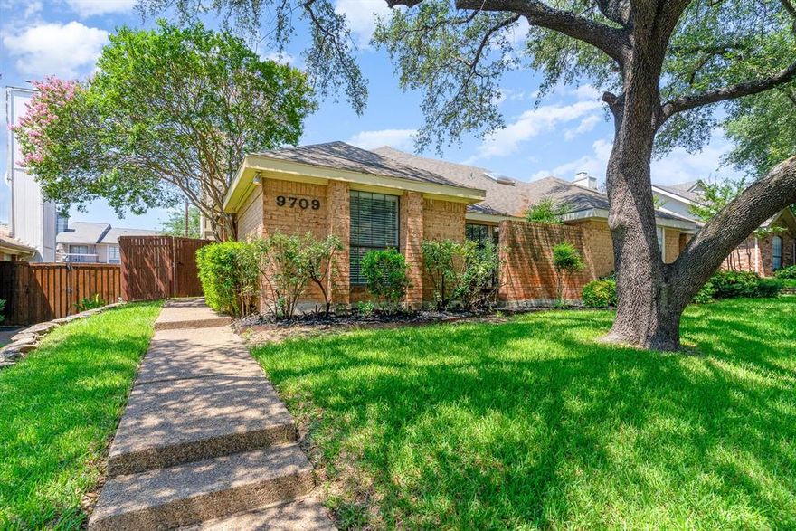 MULTIPLE OFFERS.  Highest and best due Wednesday July 27th at 6PM.  Fully renovated 2 bedroom, 2 full bathroom half duplex located minutes within 635.  Property upgrades include recently installed luxury vinyl plank floors, throughout, new paint, new counters and cabinets.  Kitchen features electric stove, built in microwave, refrigerator and skylight that offers plenty of natural light.  Primary bathroom features dual sinks, private toilet area, plenty of drawer space and a walk in closet.  Large oversized two car garage, security system and sprinkler system.  Backyard covered patio, yard and front garden area. AC unit replaced in 2022.