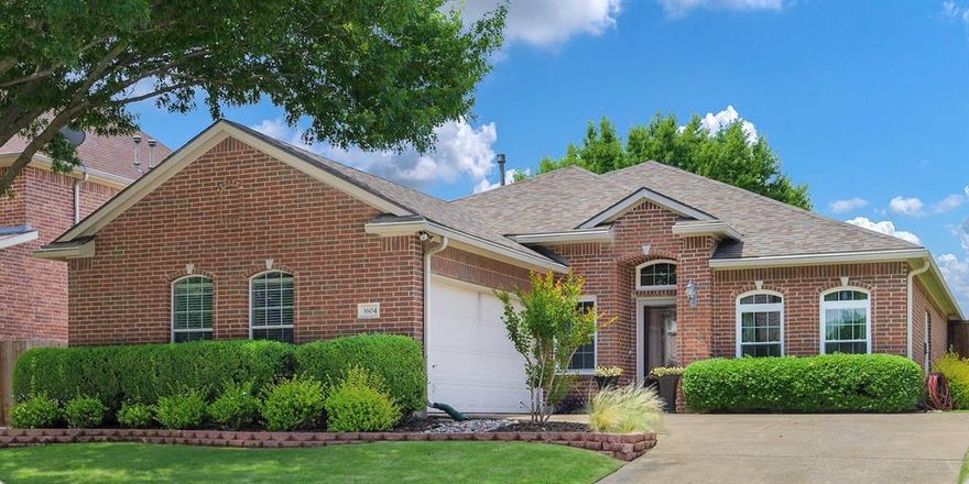 Comfortable and inviting, this meticulously maintained one-owner NewMark home offers an exceptional location near the 75 and 121 corridor with convenient access to shopping, dining, and scenic walking paths along the Crepe Myrtle Trail. Located less than two miles from the McKinney Apex Centre and John and Judy Gay Library, this thoughtfully updated one-story home blends comfort, functionality, and everyday convenience in one desirable setting. Move-in ready with timeless appeal, the home features neutral paint tones, hardwood floors, and tile throughout. The open-concept layout is designed for both everyday living and entertaining, anchored by a living area with a gas log fireplace that creates a warm and inviting atmosphere. The kitchen showcases granite countertops, classic 42-inch wood cabinets, and an eat-in dining area that flows into the main living space. The calming primary suite offers a private sitting area, peaceful backyard views, and two separate oversized walk-in closets providing exceptional storage. Step outside to enjoy the fenced backyard with a remote controlled louvered covered pergola with ceiling fan, creating the ideal space for morning coffee, outdoor dining, or relaxing evenings with friends and family. The office has a built in closet which offers flexibility as a 4th bedroom. Thoughtful updates throughout the home include bathrooms with quartz countertops, epoxy garage flooring, new windows installed in 2024, a radiant barrier added in the attic in 2024, HVAC unit replaced in 2022, and a roof replaced in 2024. These improvements add comfort, energy efficiency, and long-term value. Enjoy convenient access to nearby downtown McKinney, Costco, the McKinney ISD football stadium, the future Sunset Amphitheater music venue, and a variety of parks, restaurants, shopping destinations, sports venues, and hospitals. Combining location, thoughtful updates, and pride of ownership, this well-cared-for home is ready for its next chapter